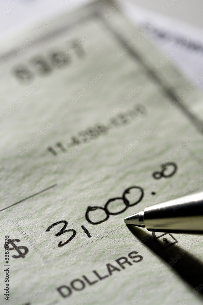 Fotografie Writing a check