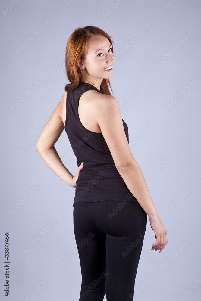 Young think brunette in black t-shirt