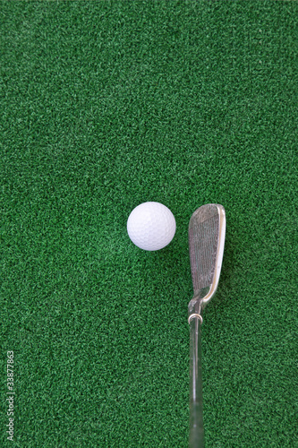 golf club and ball on the artificial turf,Looking down at the An