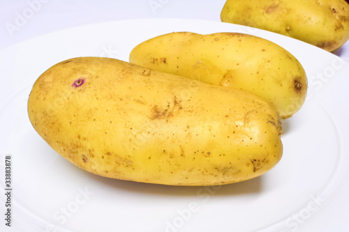 fresh potato on wehite plate.JPG