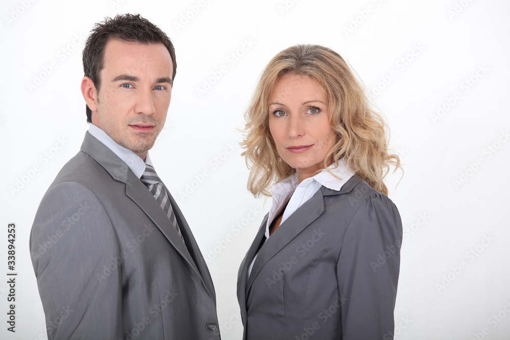 Couple in gray suit on white background Couple in gray suit on white background