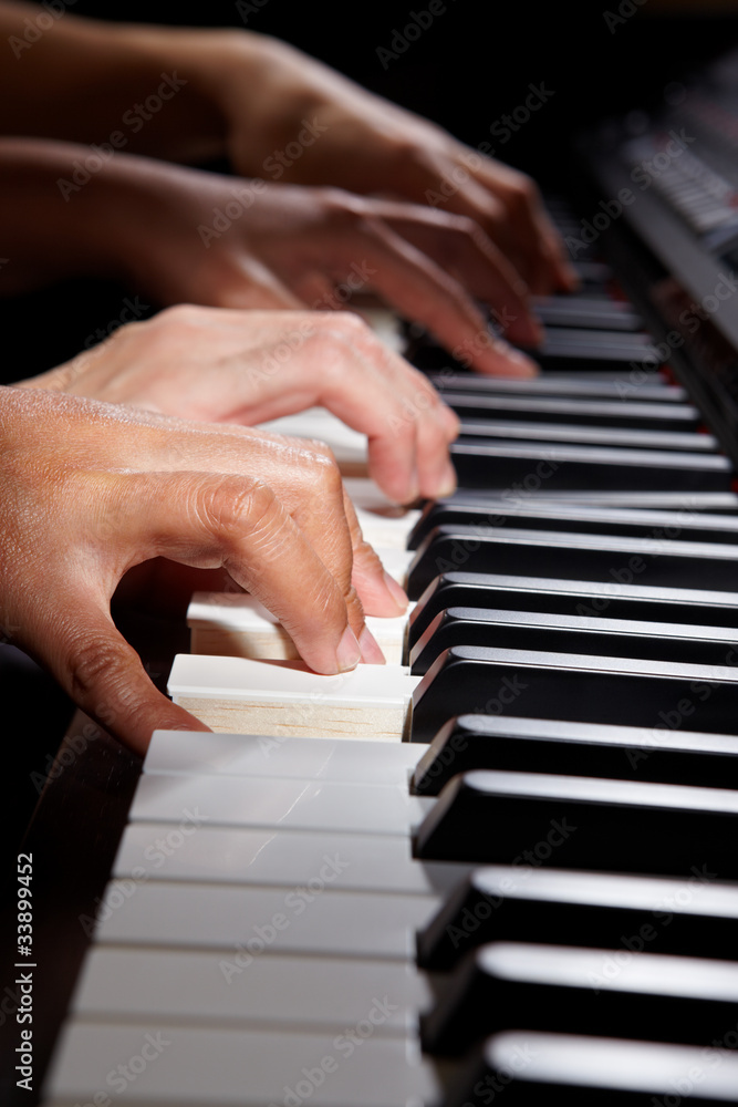 Obraz premium Playing digital hybrid piano