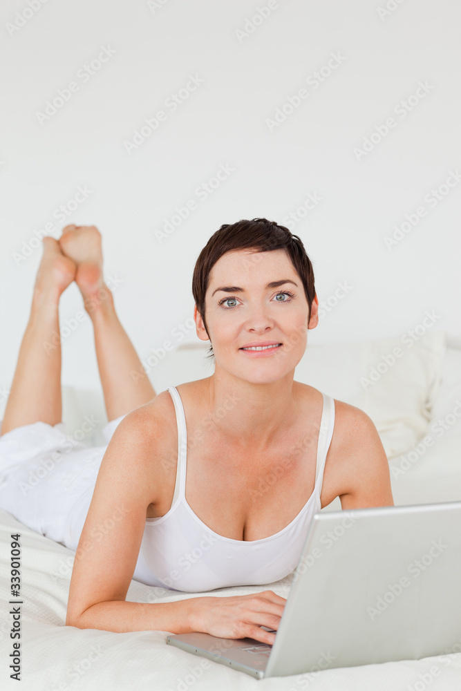 Portrait of a woman using a laptop Portrait of a woman using a laptop