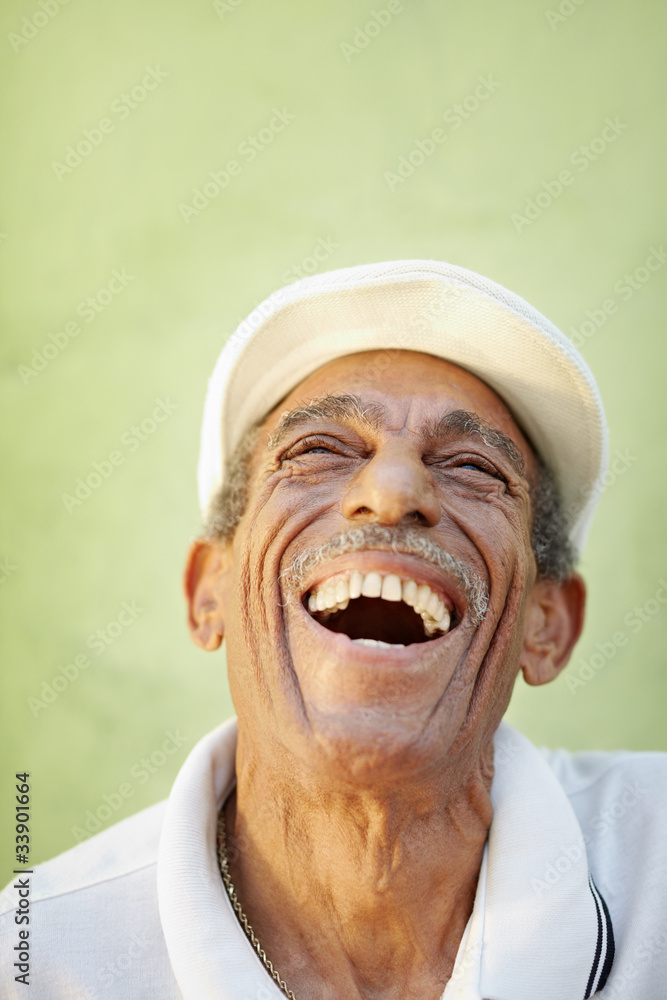 aged latino man smiling for joy aged latino man smiling for joy