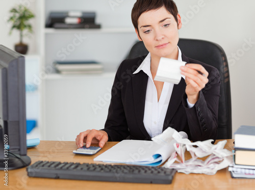 Professional office worker doing accountancy