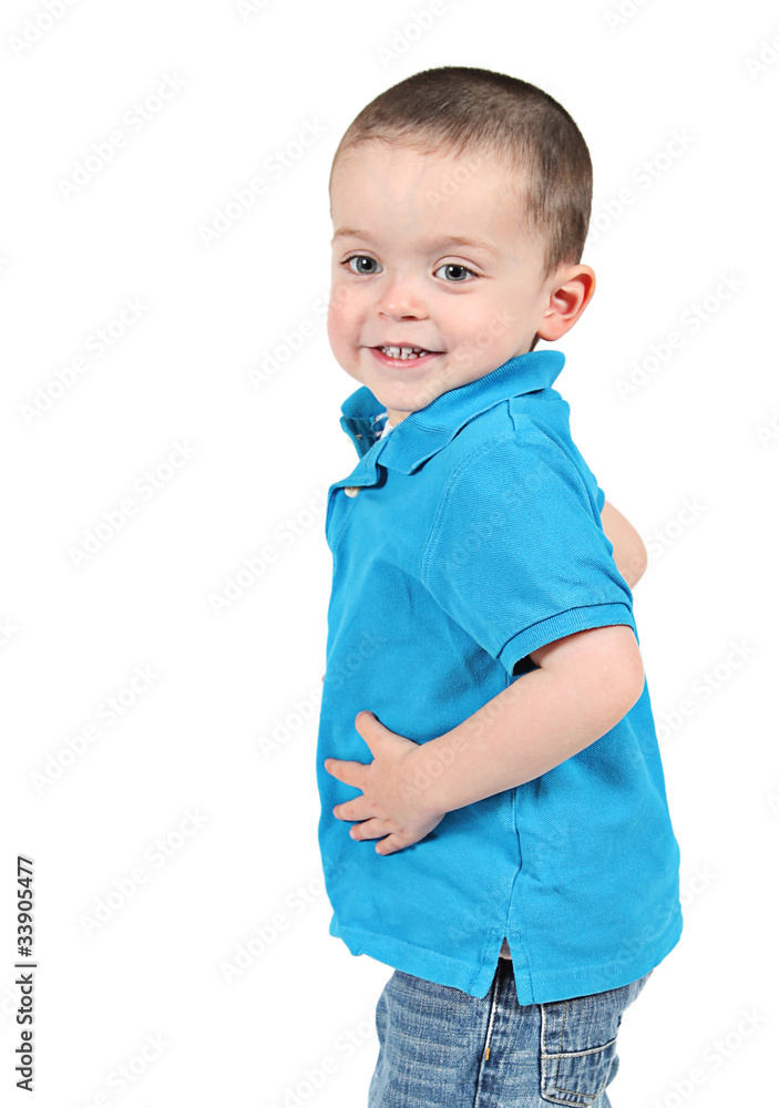 Cute little boy posing for camera on white background Cute little boy posing for camera on white background