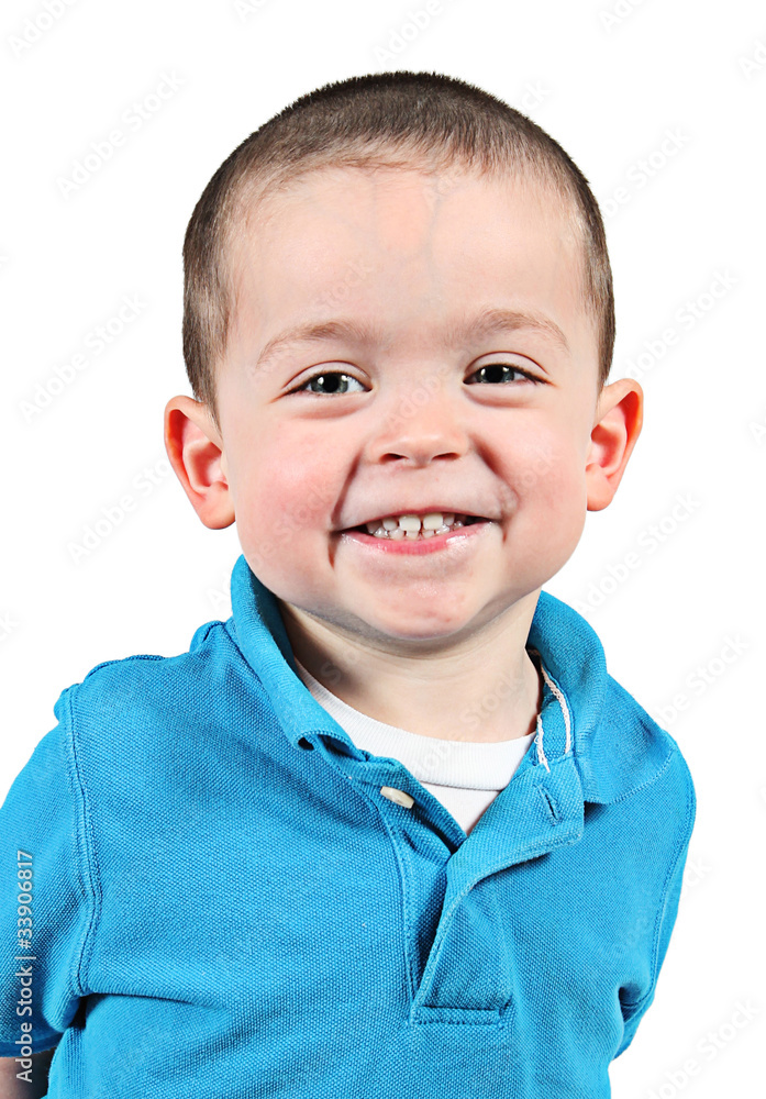 Cute little boy posing for camera on white background Cute little boy posing for camera on white background