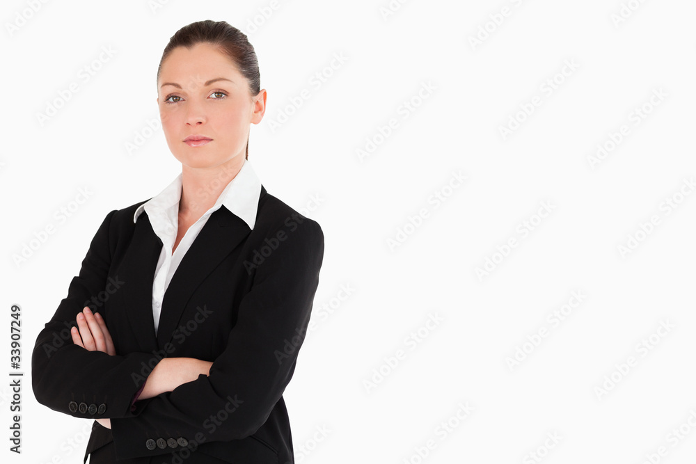 Attractive woman in suit posing while standing Attractive woman in suit posing while standing