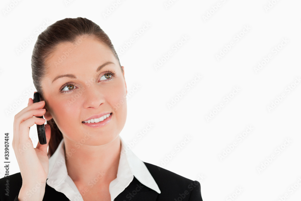 Portrait of a gorgeous woman in suit on the phone Portrait of a gorgeous woman in suit on the phone