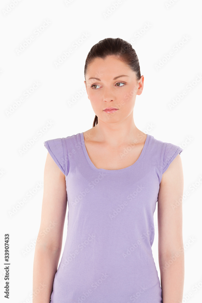 Sad female posing while standing Sad female posing while standing
