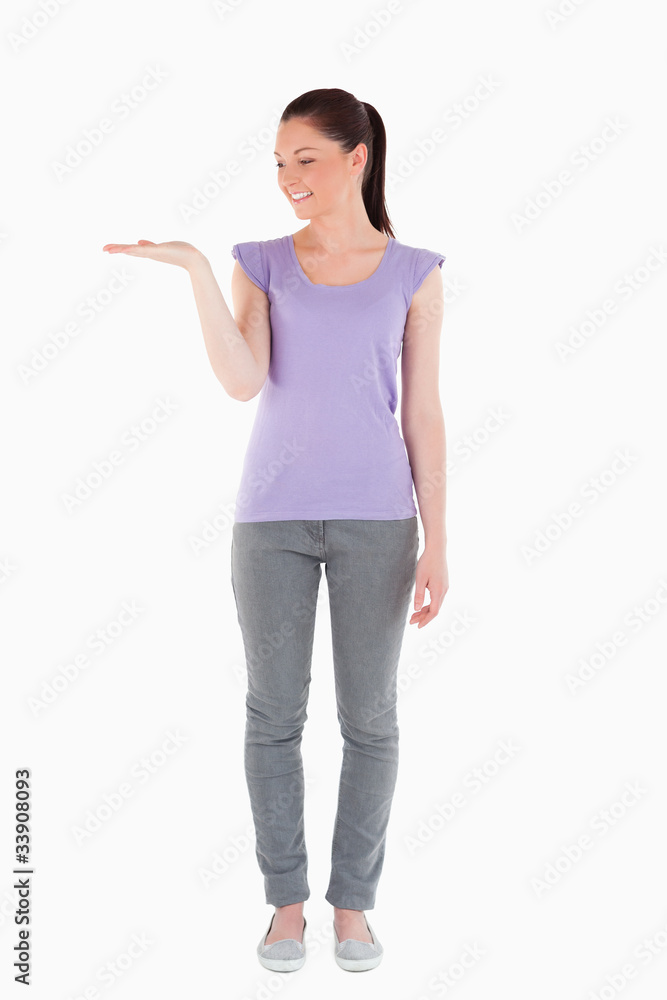 Good looking woman showing a copy space Good looking woman showing a copy space