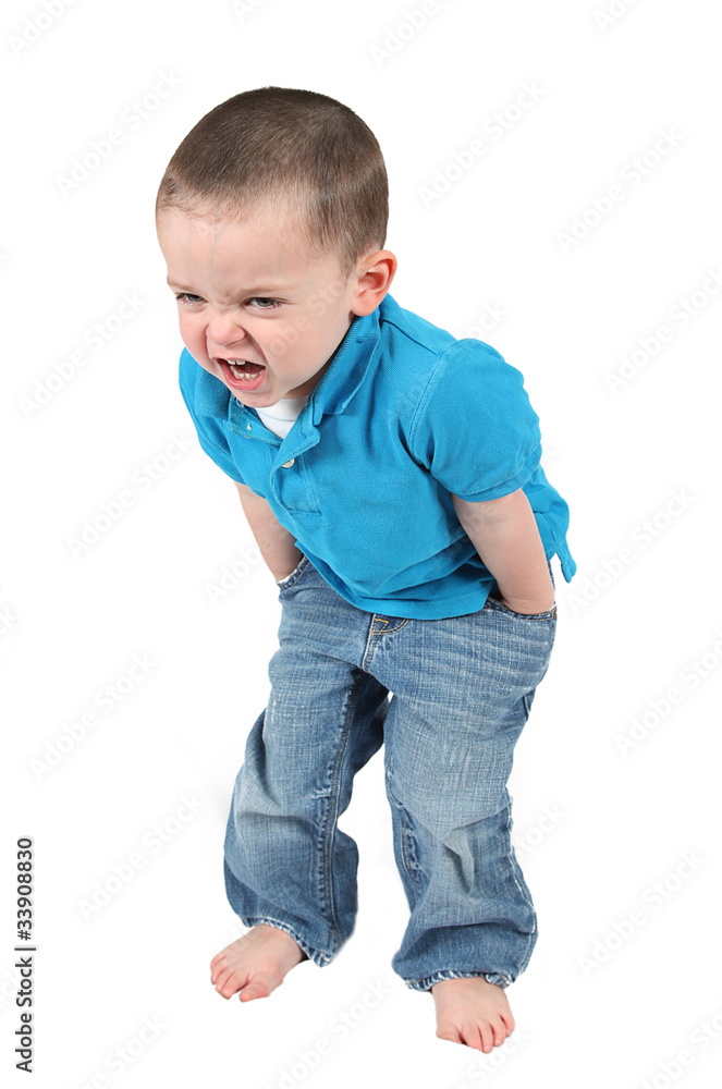 Cute little boy posing for camera on white background Cute little boy posing for camera on white background