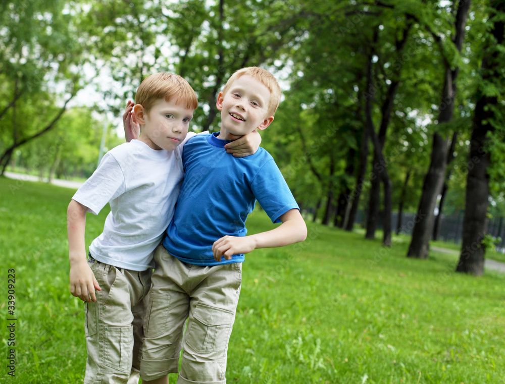 Portrait of two boys in the summer outdoors Portrait of two boys in the summer outdoors