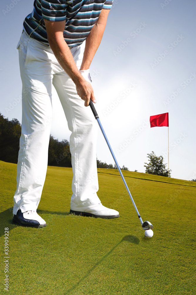 Fototapeta premium Man playing golf