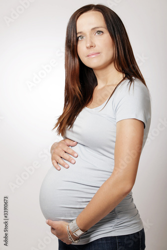 Beautiful pregnant woman with long dark hair. Free Download Beautiful pregnant woman with long dark hair. - GFXLoad