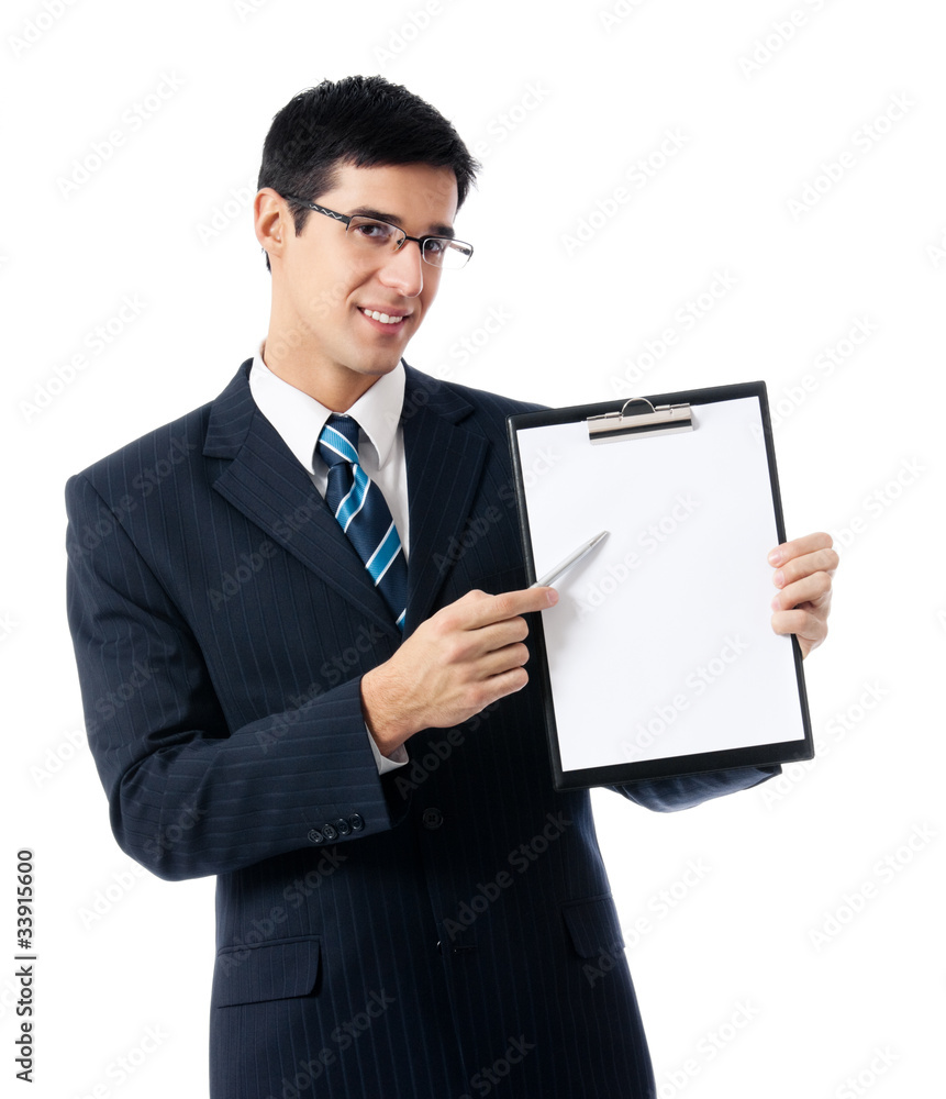 Young happy businessman showing clipboard, isolated Young happy businessman showing clipboard, isolated