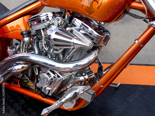 Motor detail of a custom bike orange photo