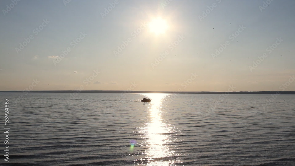 ship sailing into the sunrise. ship sailing into the sunrise.