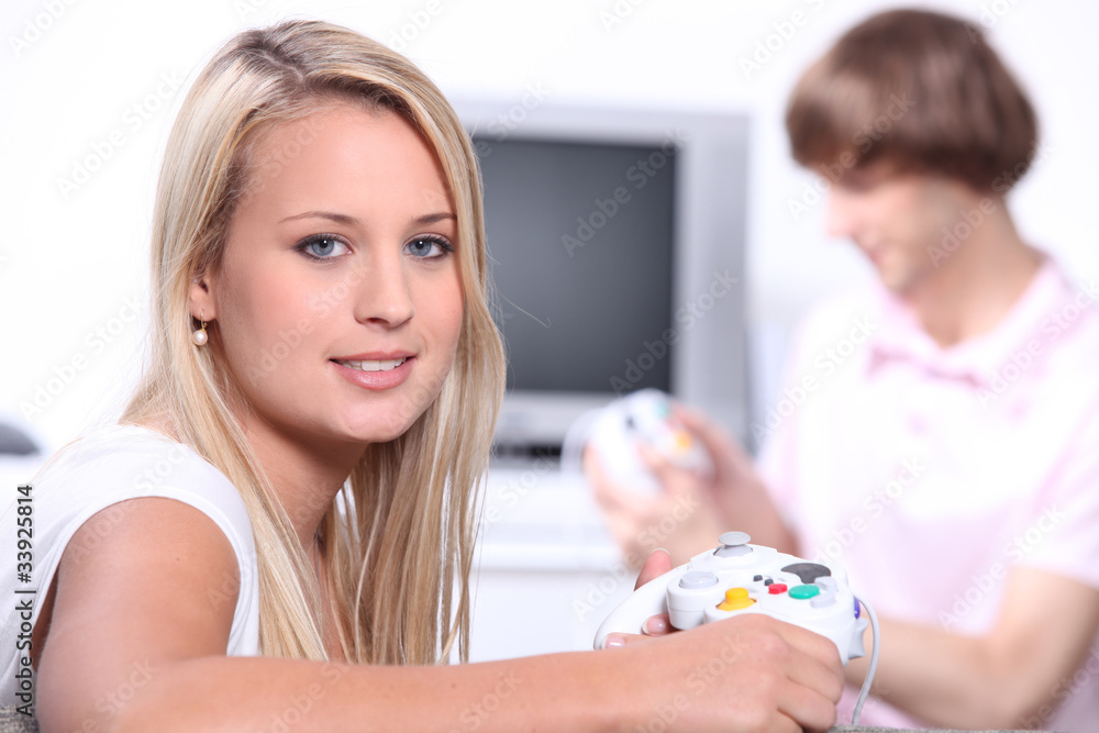 Teenagers playing computer games Teenagers playing computer games