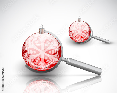 Vector magnifying glass with Christmas ball