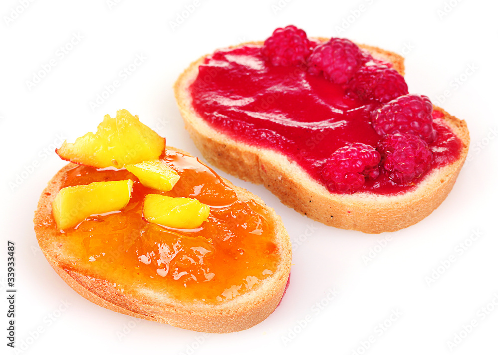 delicious toast with jam and fruit isolated on white delicious toast with jam and fruit isolated on white