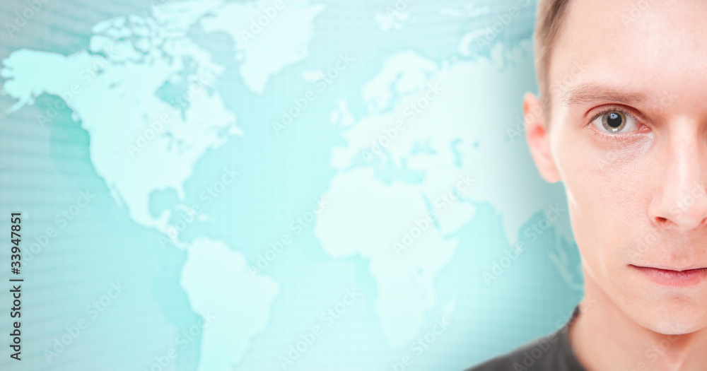 Businessman face in front of an earth map