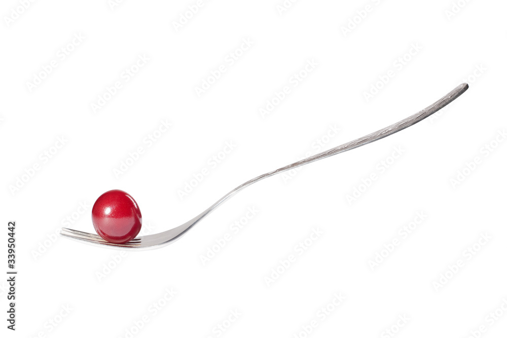 Fototapeta premium cherry on fork isolated on white background