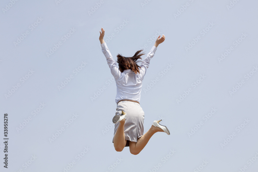 ジャンプするolの後ろ姿 Stock Photo Adobe Stock ジャンプするolの後ろ姿 Stock Photo Adobe Stock