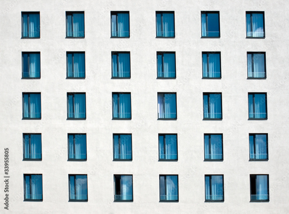 White facade with windows White facade with windows