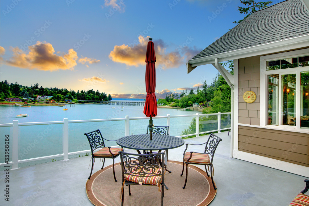 Luxury deck with water view - obrazy, fototapety, plakaty 