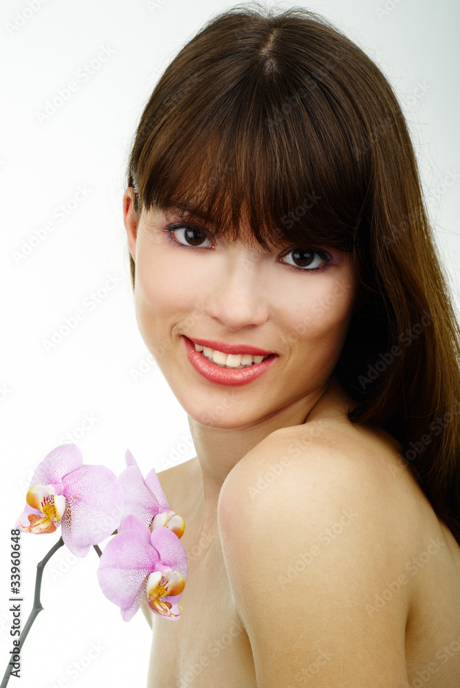 woman with an orchid