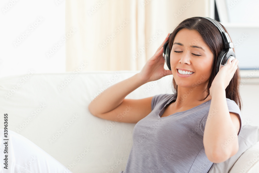 lovely woman with earphones and closed eyes lovely woman with earphones and closed eyes