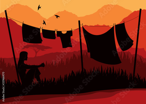 Women drying clothes in wild Africa