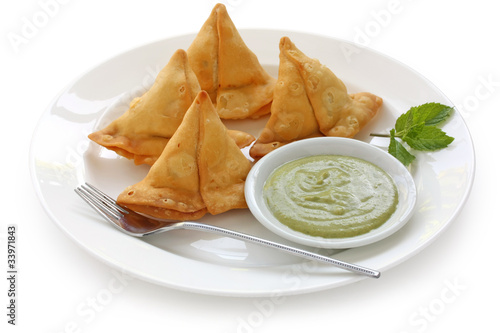 samosa with fresh mint dipping sauce , indian food