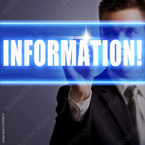 young businessman touching info screen