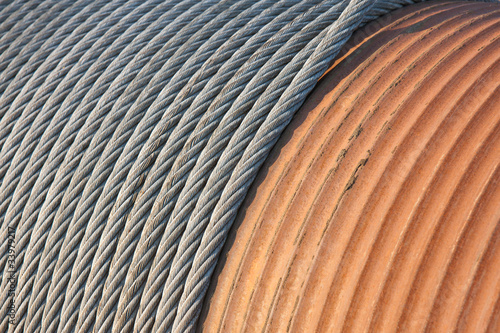Canvas Print Detail of a big winch winding a steel cable