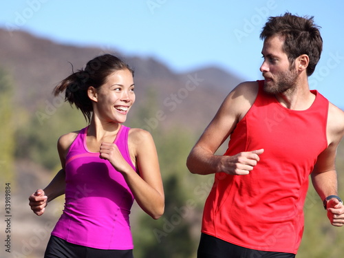 Happy couple running