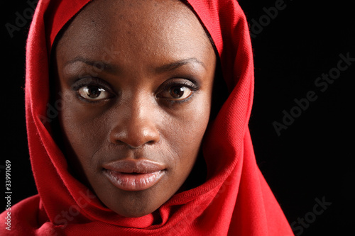 Headshot beautiful black african woman in hijab