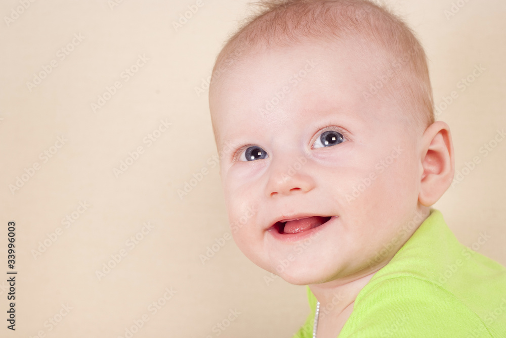 baby lying on sofa