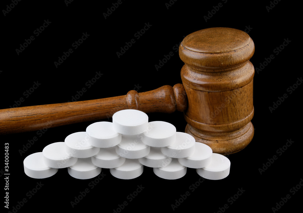 Judge's gavel and tablets isolated on black Judge's gavel and tablets isolated on black