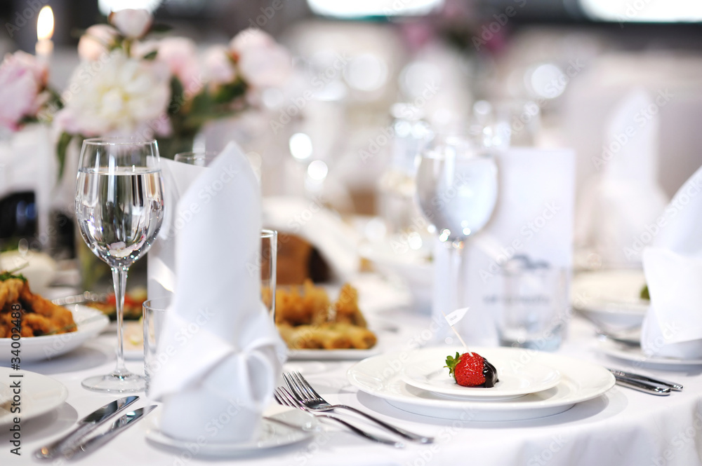 Table set for an event party or wedding reception Table set for an event party or wedding reception
