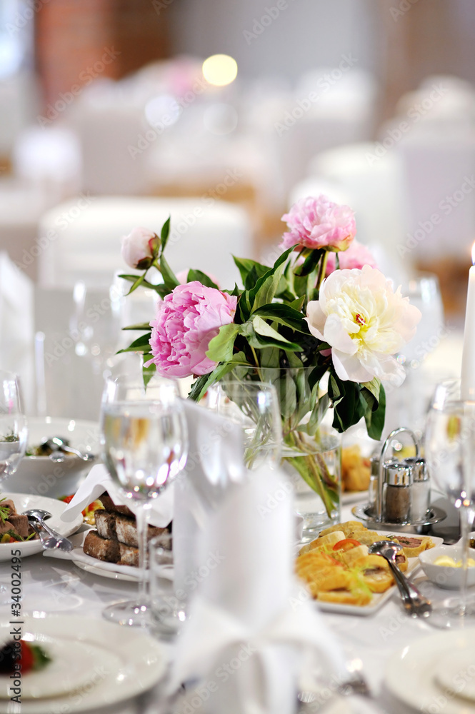 Table set for an event party or wedding reception Table set for an event party or wedding reception