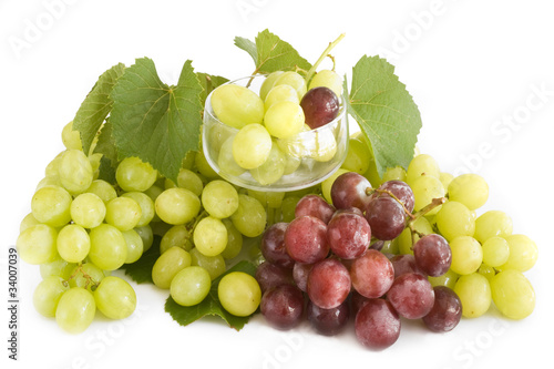 fresh green and red grape with leaves