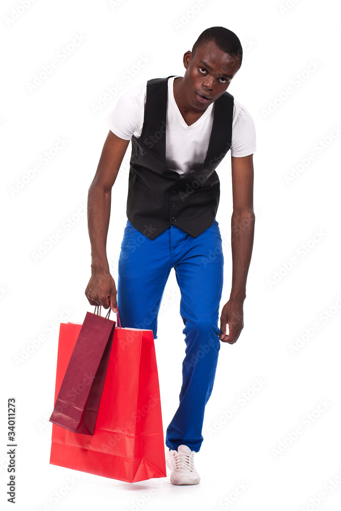 black man holding shopping bags black man holding shopping bags