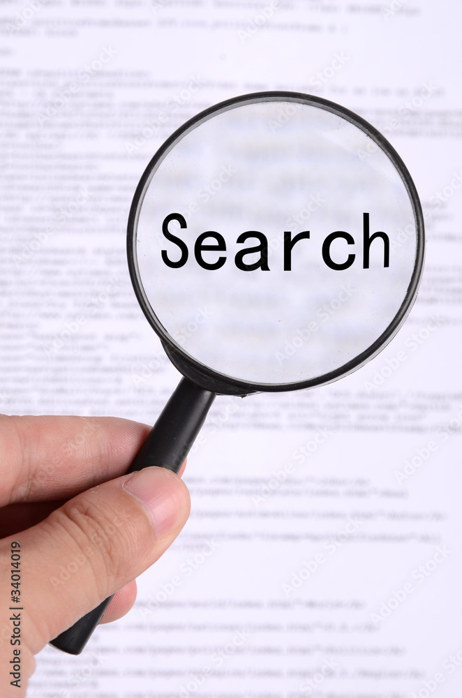 Magnifying glass in hand Magnifying glass in hand