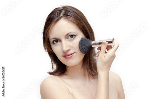Girl applying make up