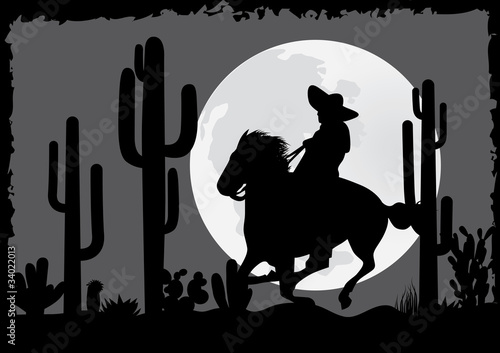 Horseman rides in the desert