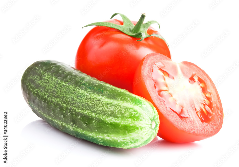 Ripe red tomatoes and cucumber isolated on white with Clipping P Ripe red tomatoes and cucumber isolated on white with Clipping P