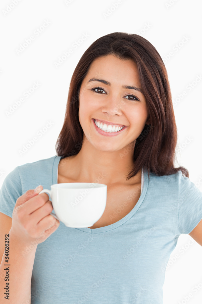 Beautiful woman enjoying a cup of coffee Beautiful woman enjoying a cup of coffee