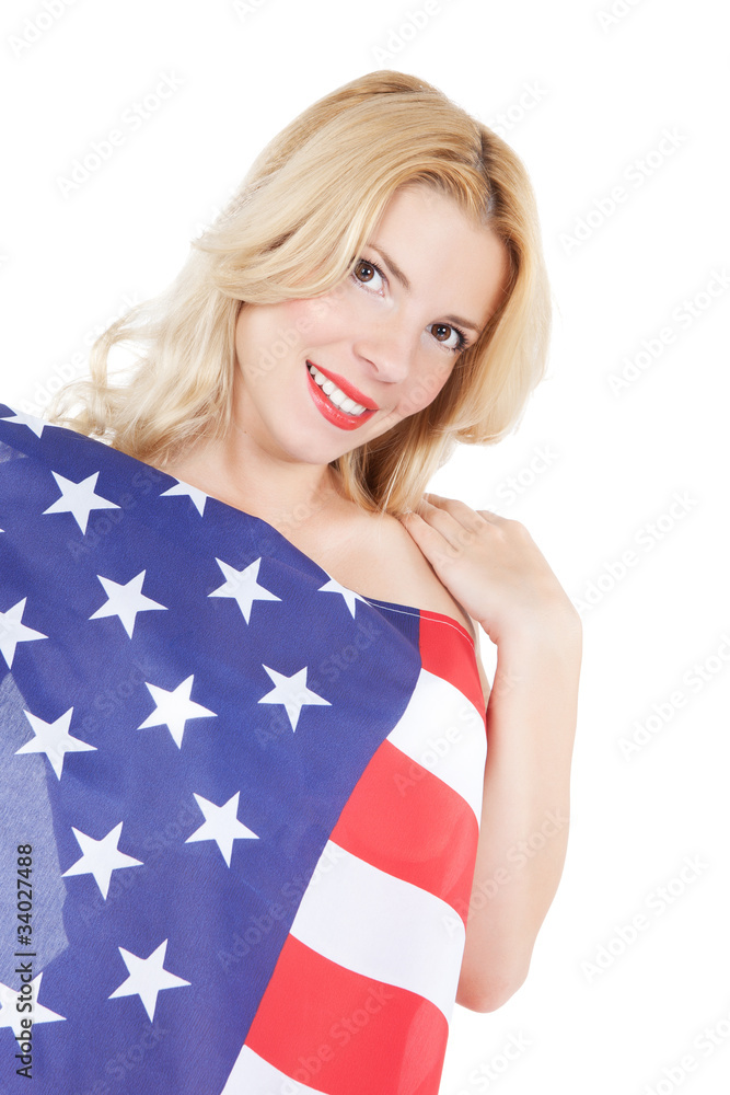 Happy young woman wearing american flag Happy young woman wearing american flag
